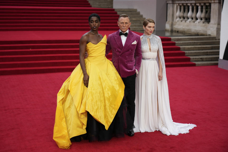 Lashana Lynch, from left, Daniel Craig and Lea Seydoux pose for photographers upon arrival for the World premiere of the new film from the James Bond franchise 'No Time To Die', in London Tuesday, Sept. 28, 2021. (AP Photo/Matt Dunham)