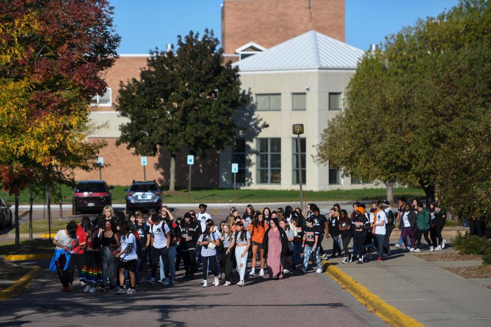 Washington High School students walk out of their classrooms in protest of the epidemic of missing and murdered Indigenous women on Thursday, Oct. 5, 2023 at Washington High School in Sioux Falls, South Dakota.