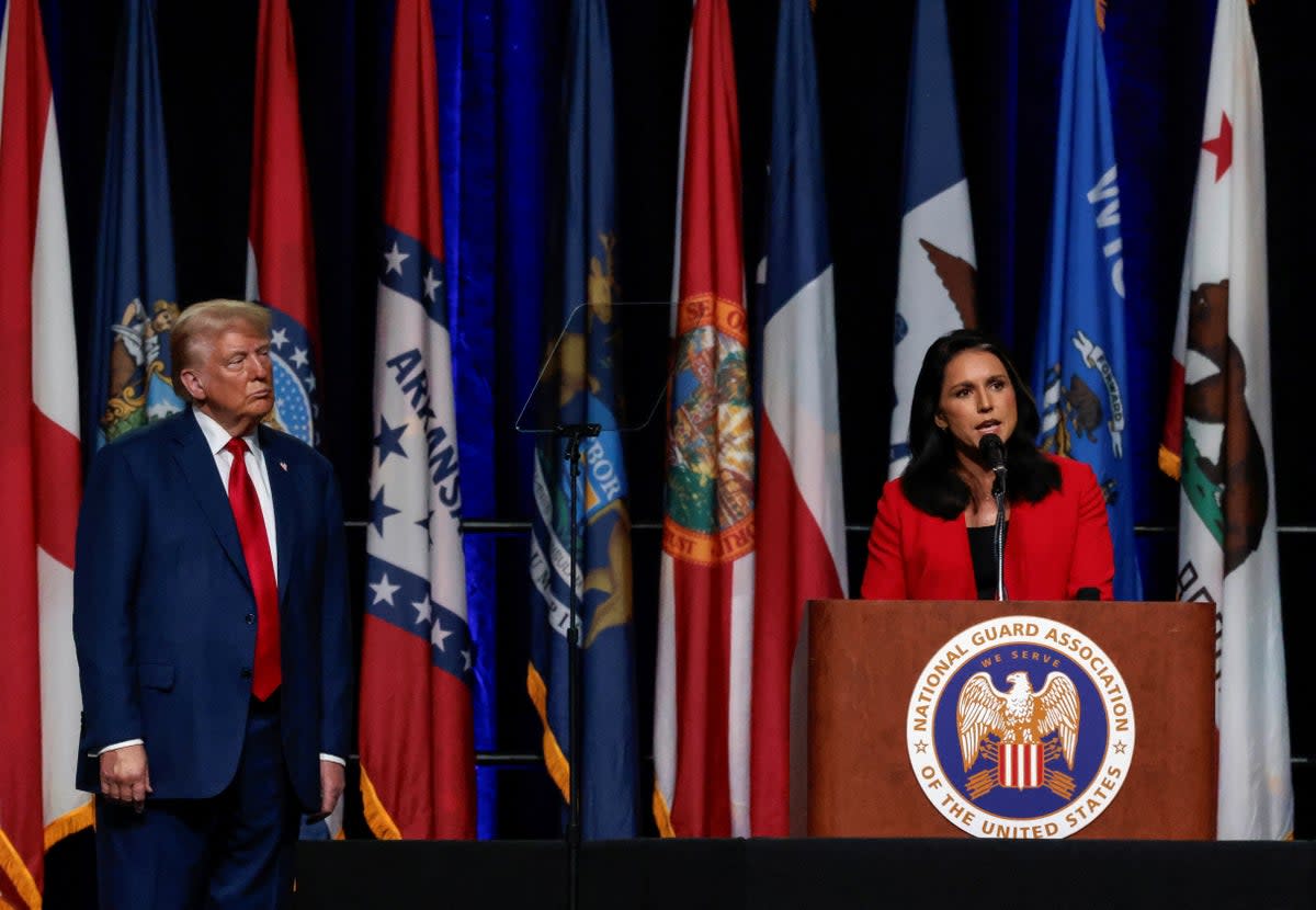 Republican presidential nominee and former U.S. President Donald Trump listens as former Democratic presidential candidate Tulsi Gabbard speaks at the National Guard of the United States NGAUS General Conference in Detroit, Michigan U.S., August 26 (REUTERS)