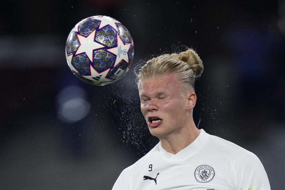 Manchester City's Erling Haaland heads the ball during a training session at the Ataturk Olympic Stadium in Istanbul, Turkey, Friday, June 9, 2023. Manchester City and Inter Milan are making their final preparations ahead of their clash in the Champions League final on Saturday night. (AP Photo/Manu Fernandez)