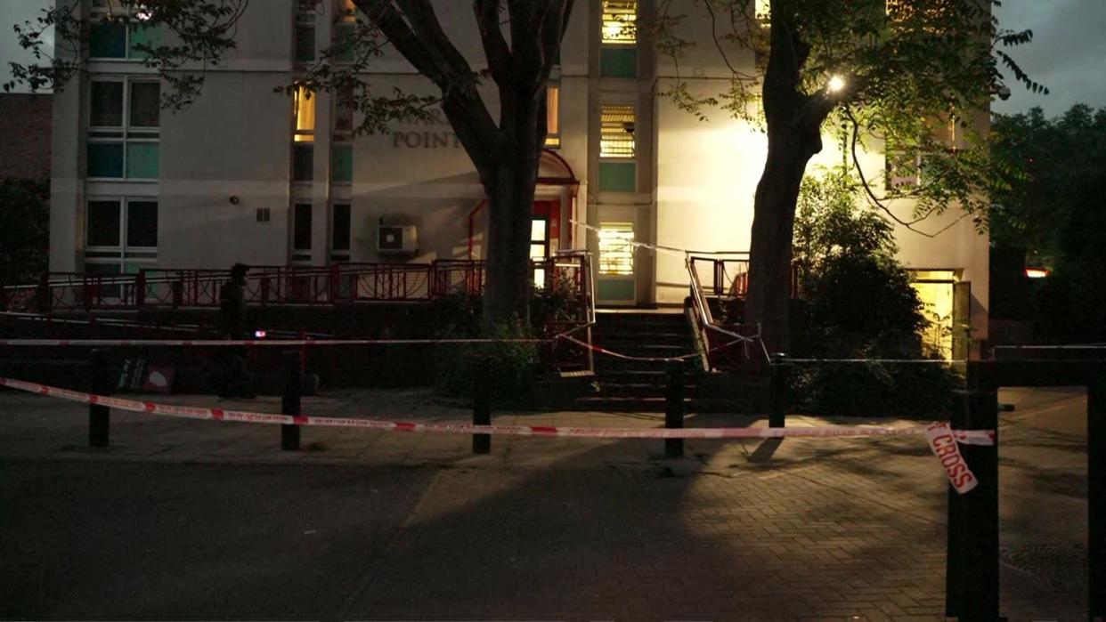 Police tape seen at the scene outside the block of flats in Kennington