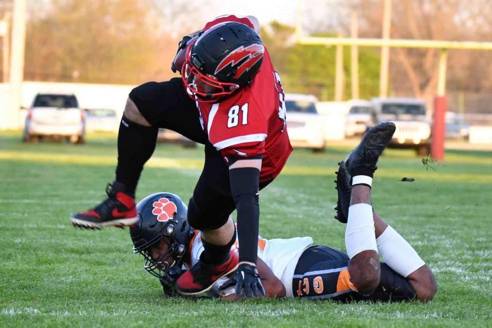 Monroe graduate Tyler Hammack makes a catch for the Southeast Michigan Red Storm semipro football team in a game against the Glass City Tigers on Saturday, May 7, 2022.