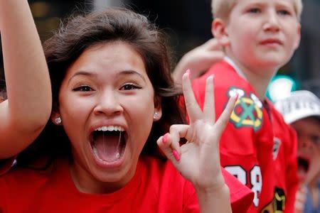 Jun 18, 2015; Chicago, IL, USA; Chicago Blackhawks fans cheer during the 2015 Stanley Cup championship parade and rally at Soldier Field. Mandatory Credit: Jon Durr-USA TODAY Sports