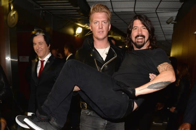 Josh Homme (L) of Queens of the Stone Age and Dave Grohl of Foo Fighters attends the 56th GRAMMY Awards at Staples Center on January 26, 2014 in Los Angeles, California.  - Credit: Jason Kempin/WireImage