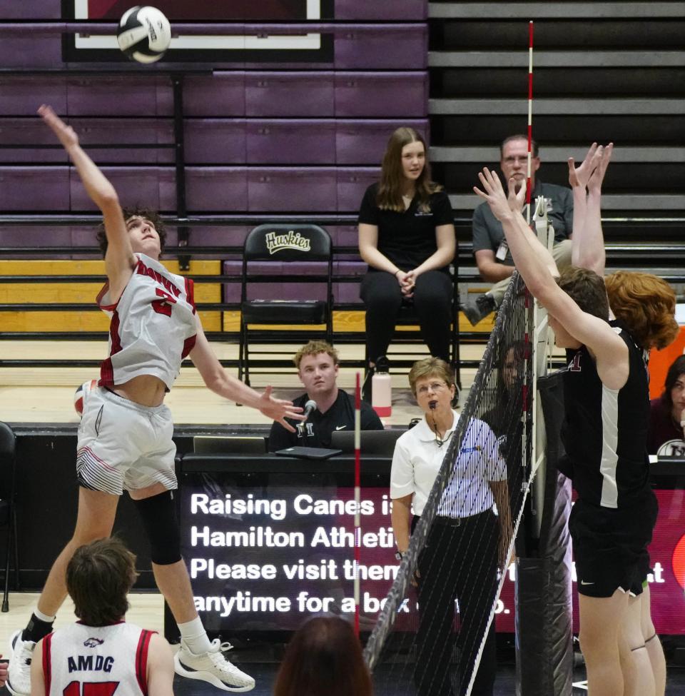 Brophy Prep senior Connor Oldani (2) spikes against Hamilton during a game at Hamilton High School in Chandler on April 4, 2024.