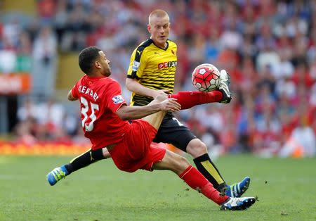 Britain Soccer Football - Liverpool v Watford - Barclays Premier League - Anfield - 8/5/16 Liverpool's Kevin Stewart in action with Watford's Ben Watson Action Images via Reuters / Carl Recine Livepic EDITORIAL USE ONLY.