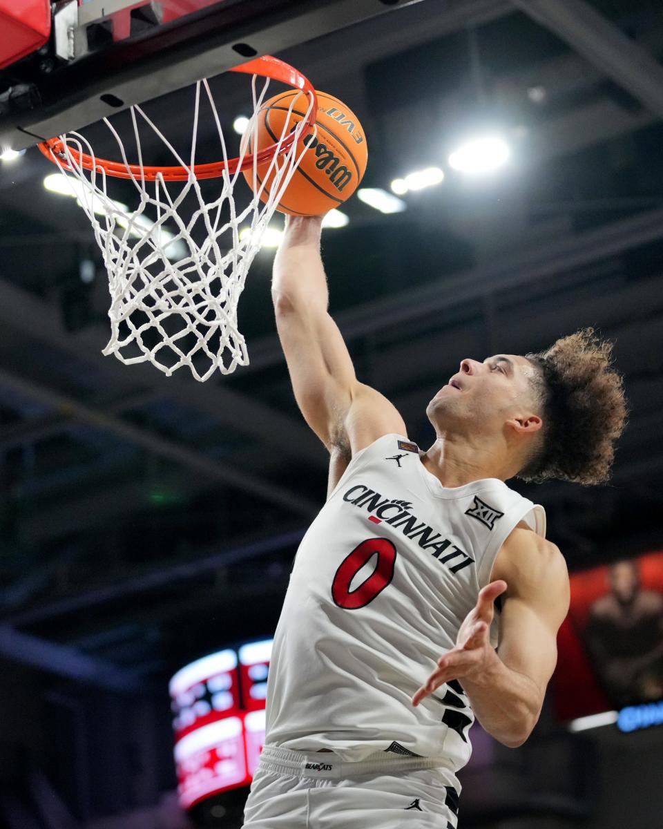 Cincinnati Bearcats guard Dan Skillings Jr. (0) dunks during UC's second-round NIT win over Bradley March 23.