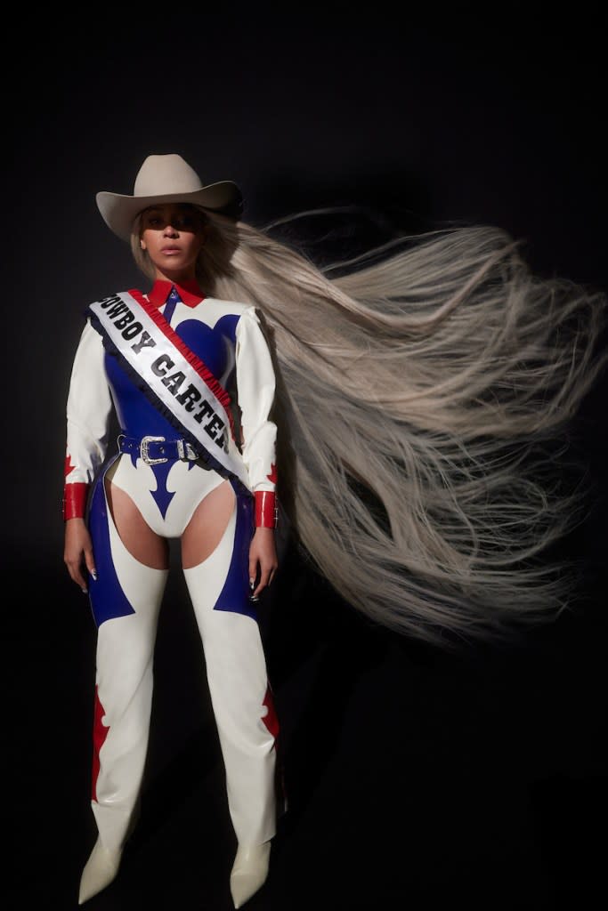 Beyoncé dresses up in red, white and blue for her “Cowboy Carter” shoot. PARKWOOD ENTERTAINMENT LLC.