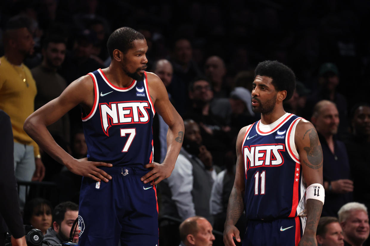 Kevin Durant and Kyrie Irving are key to many of the Brooklyn Nets' offseason decisions. (Al Bello/Getty Images)