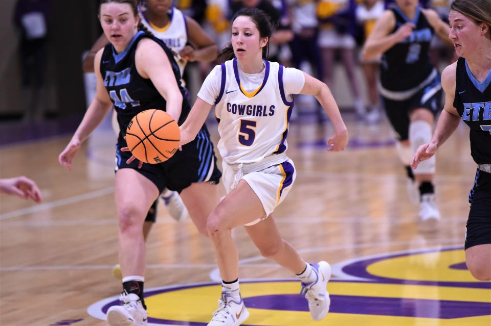 Hardin-Simmons' Brittany Schnabel (5) leads a fast break during Thursday's top 20 matchup against No. 20 East Texas Baptist. Schnabel scored a game-high 16 points in the 56-51 loss.