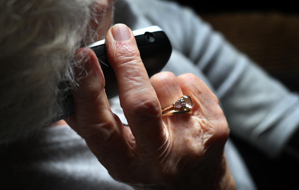 ILLUSTRATION - 11 October 2019, Bavaria, Würzburg: An elderly woman is using a cordless landline phone. Photo: Karl-Josef Hildenbrand/dpa (Photo by Karl-Josef Hildenbrand/picture alliance via Getty Images)