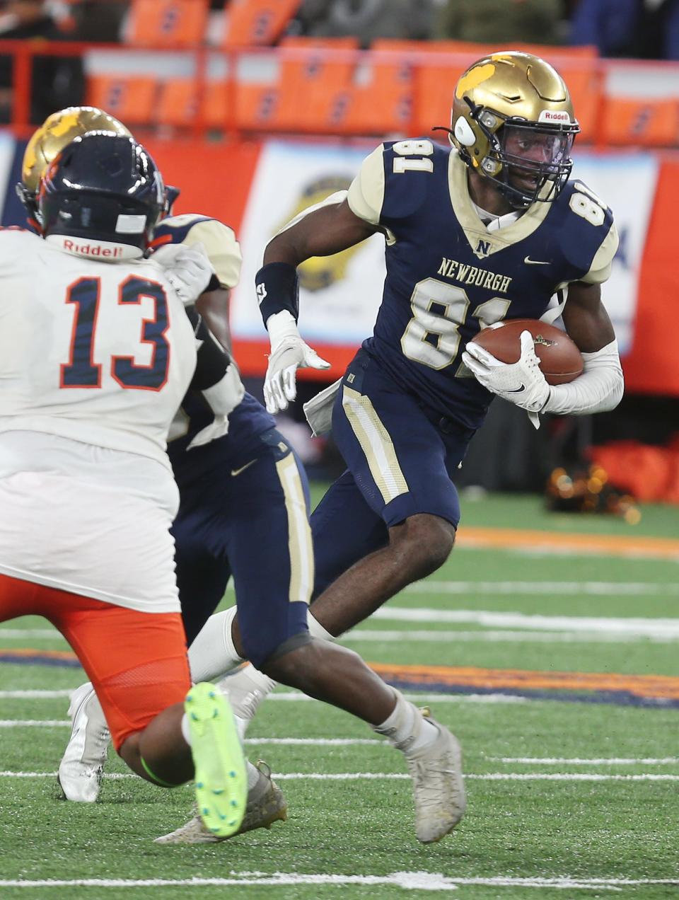 Newburgh's Deondre Johnson (81) looks for some running room in the Bennett defense during the state Class AA football championship at JMA Wireless Dome in Syracuse Dec. 4, 2022. 