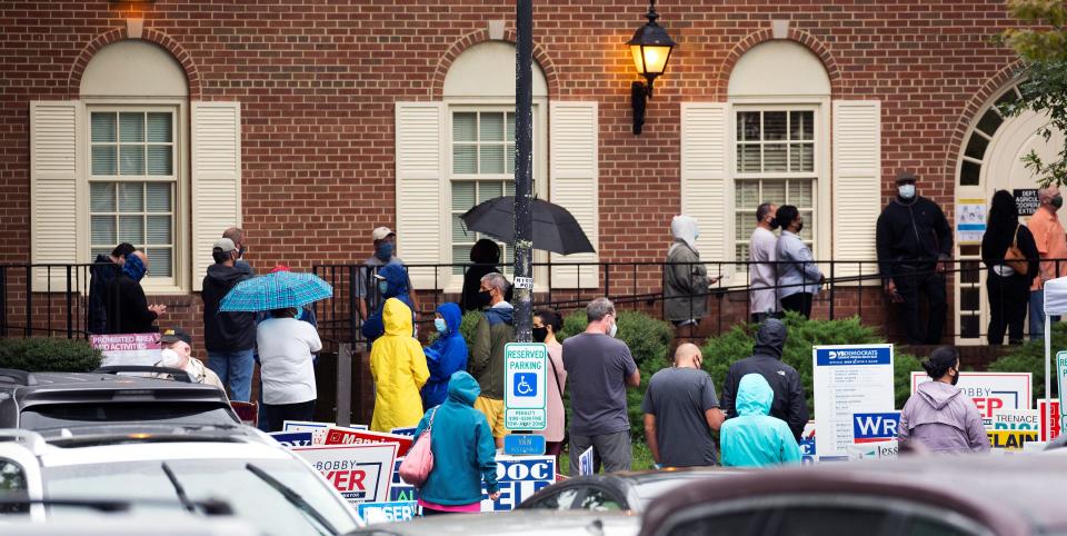 Voters line up in Virginia Beach, Va., for early voting Sept. 18.