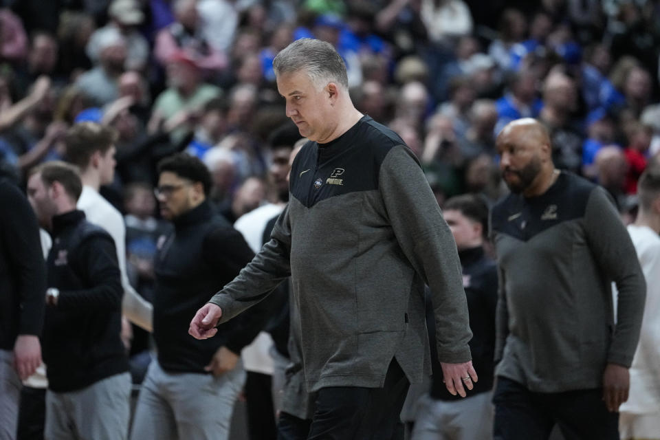 FILE - Purdue head coach Matt Painter walks off the court after losing to Fairleigh Dickinson 63-58 in a first-round college basketball game in the men's NCAA Tournament in Columbus, Ohio, Friday, March 17, 2023. Virginia coach Tony Bennett said he offered to talk with Purdue coach Matt Painter as a resource after the Boilermakers’ loss to Fairleigh Dickinson. (AP Photo/Michael Conroy, File)