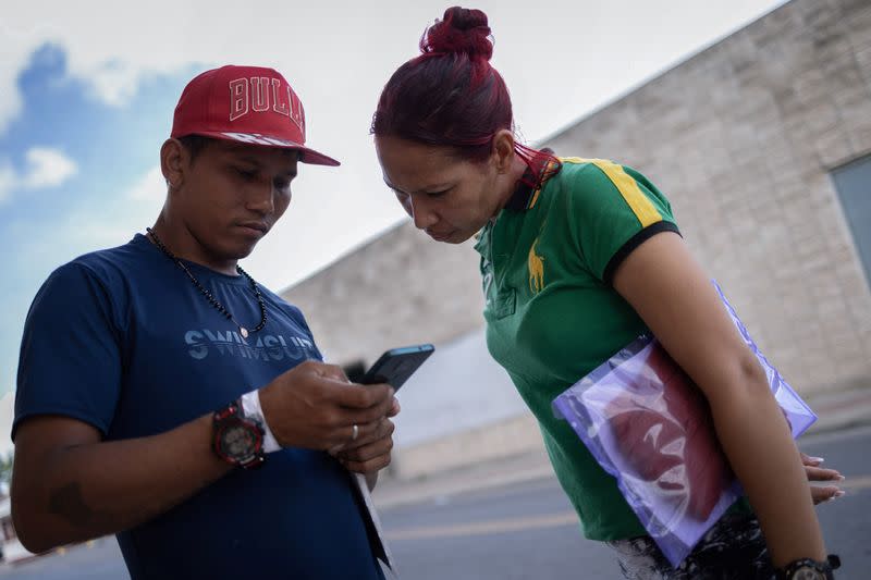 The Wider Image: The toll on migrants of a free bus north from the border