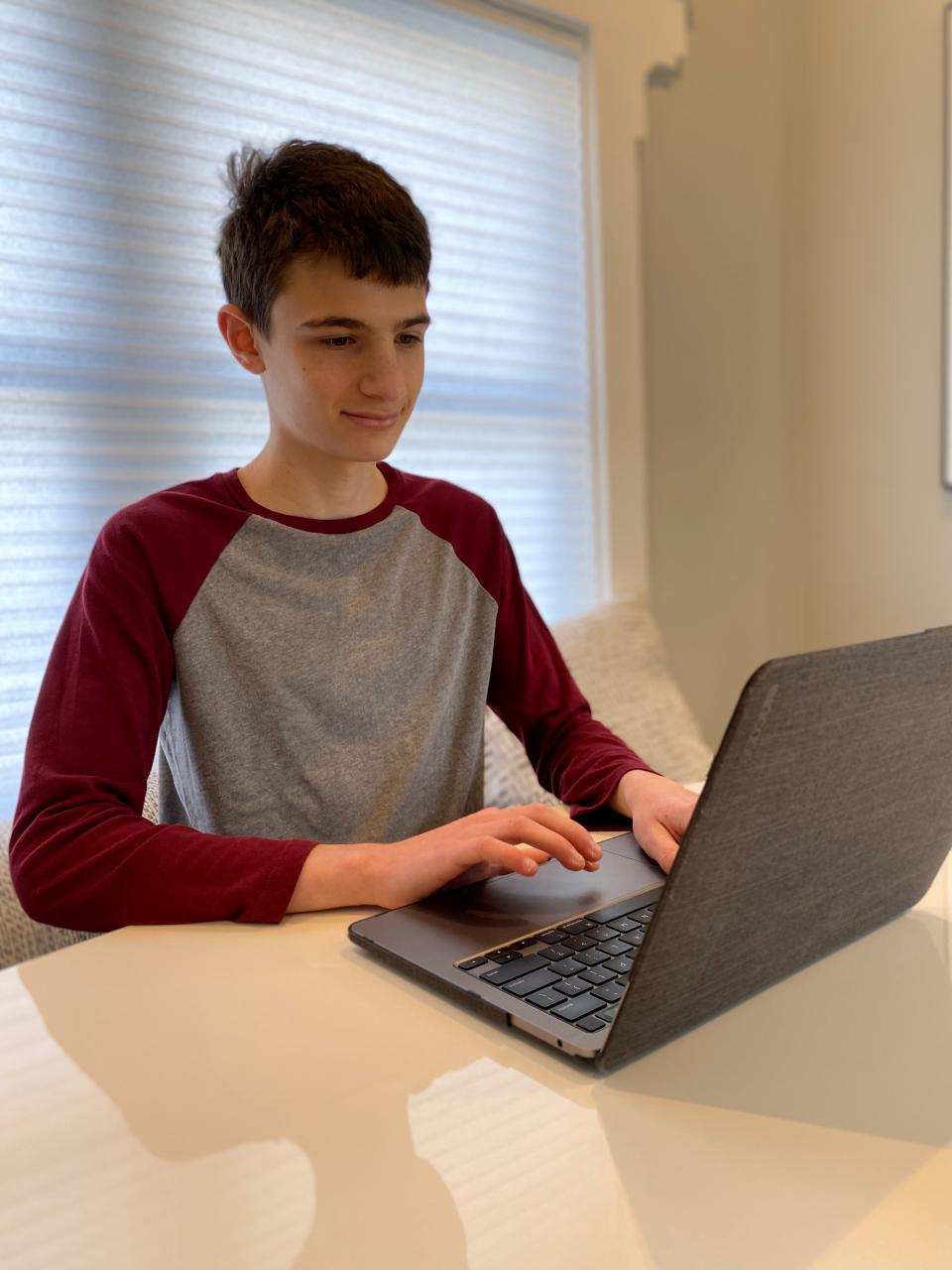 Eli Coustan, 14, created the website Findacovidtest.org to help people find the at-home coronavirus tests. A ninth grader, Eli says he's interested in studying computer science but wants to do something where he "can help people."