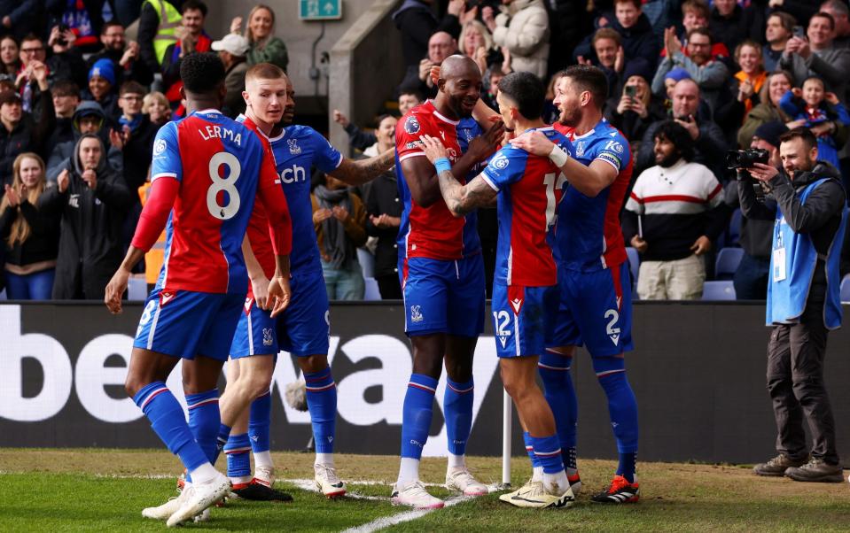 Jean-Philippe Mateta of Crystal Palace celebrates scoring his team's first goal with teammates during the Premier League match between Crystal Palace and Luton Town at Selhurst Park