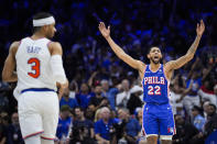 Philadelphia 76ers' Cameron Payne (22) reacts past New York Knicks' Josh Hart (3) during the second half of Game 6 in an NBA basketball first-round playoff series, Thursday, May 2, 2024, in Philadelphia. (AP Photo/Matt Slocum)