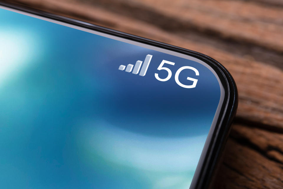 Closeups Photo Of Mobile Phone Connected To 5G Network