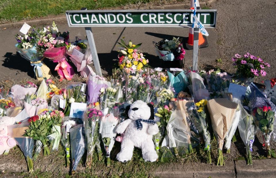 Floral tributes at the scene in Chandos Crescent in Killamarsh (Danny Lawson/PA) (PA Wire)