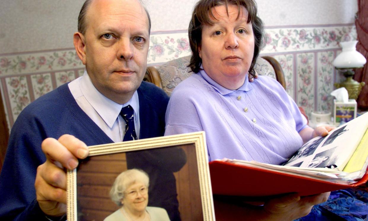 <span>John and Janice Hibbert with photographs of John's mother Hilda, a suspected victim of serial killer Harold Shipman.</span><span>Photograph: DON McPHEE/The Guardian</span>