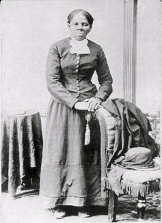 Harriet Tubman poses for a picture taking in the 19th century.