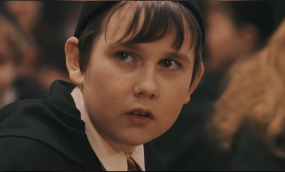 Close-up of Matthew as Neville, not smiling