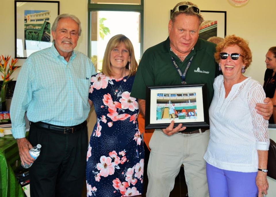 Former Sarasota County Commissioner Joe Barbetta, former Ed Smith Stadium co-manager Laura Williams, Pat Calhoon and friend Patti Schimmel at Calhoon's retirement party last month at Ed Smith Stadium.