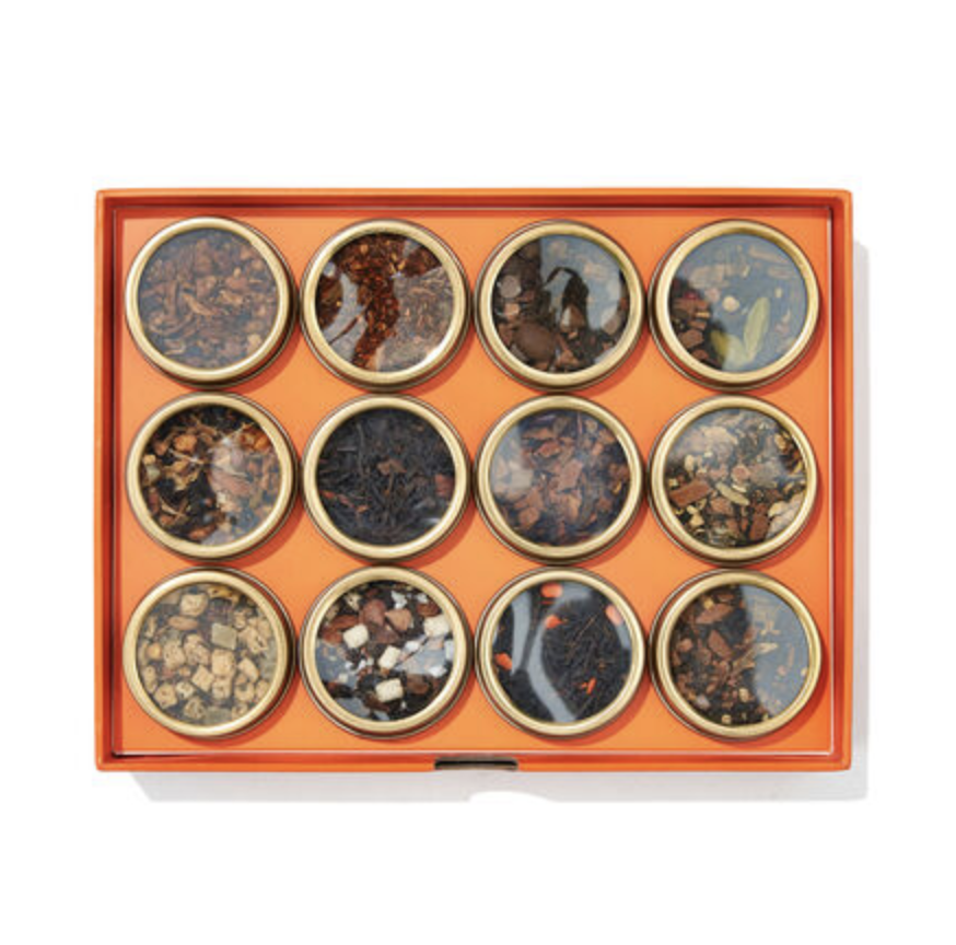 orange box of gold containers Chai Lovers 12-Tea Sampler (Photo via DavidsTea)