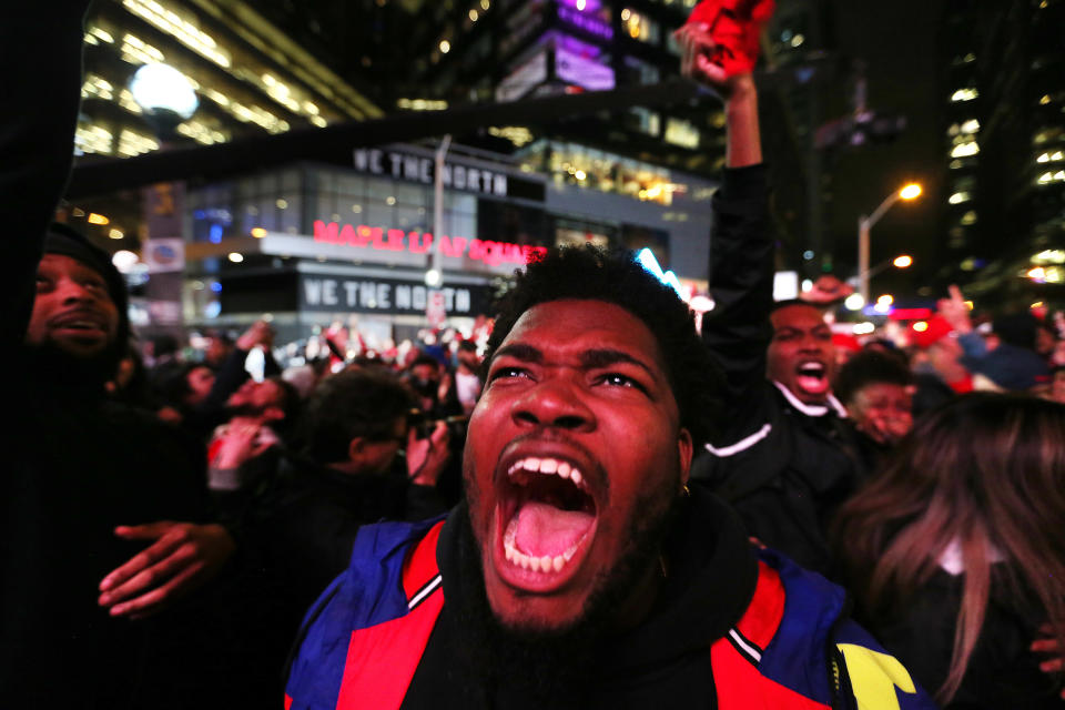 TORONTO, ON- JUNE 13 - Toronto fans watch, worry and celebrate at Jurassic park as the Toronto Raptors beat the Golden State Warriors in game six to win the NBA Championship at Oracle Arena in Oakland outside at Scotiabank Arena in Toronto. June 13, 2019. (Steve Russell/Toronto Star via Getty Images)