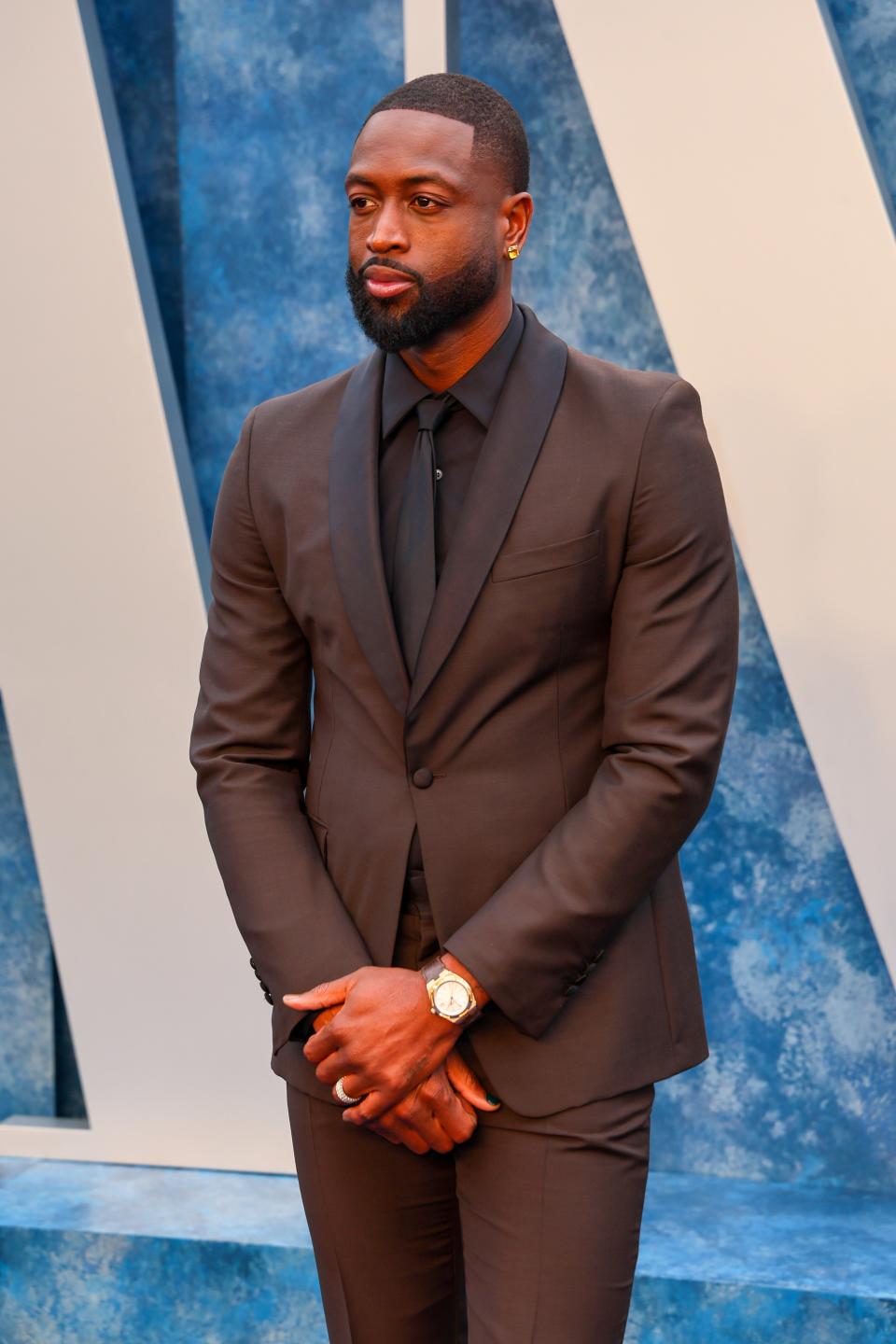 Dwyane Wade showing off a sleeker, more modern take on the shawl.