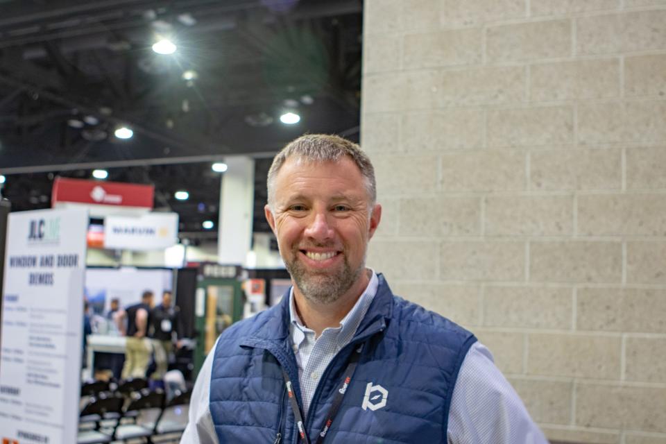 Scott Beebe poses at the JLC Live Residential Construction Show after making a presentation on ways to attract younger workers to construction jobs.