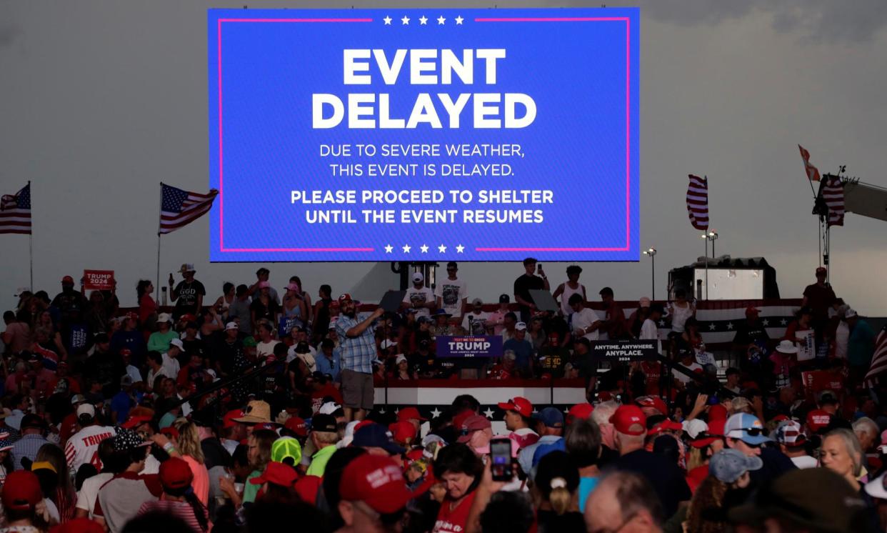 <span>Supporters of former president Donald Trump file out of a rally after it was canceled due to threatening weather in Wilmington, North Carolina.</span><span>Photograph: Chris Seward/AP</span>