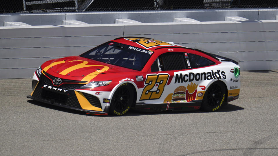 Bubba Wallace drives during NASCAR Cup Series auto race qualifying at the Michigan International Speedway in Brooklyn, Mich., Saturday, Aug. 6, 2022. Wallace won the pole position. (AP Photo/Paul Sancya)