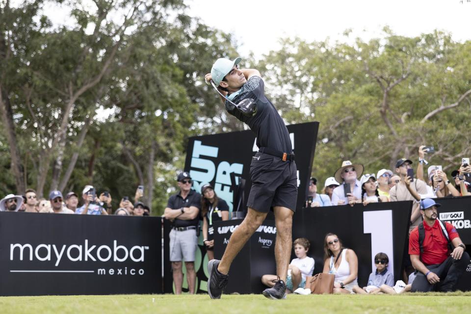 Captain Joaquín Niemann, of Torque GC, hits from the first tee during the final round of LIV Golf Mayakoba at El Camaleón Golf Course, Sunday, Feb. 4, 2024, in Playa del Carmen, Mexico. (Chris Trotman/LIV Golf via AP)