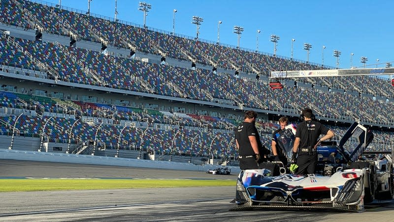 The BMW M RLL crew looking over one of its two hypercars during December’s tests.