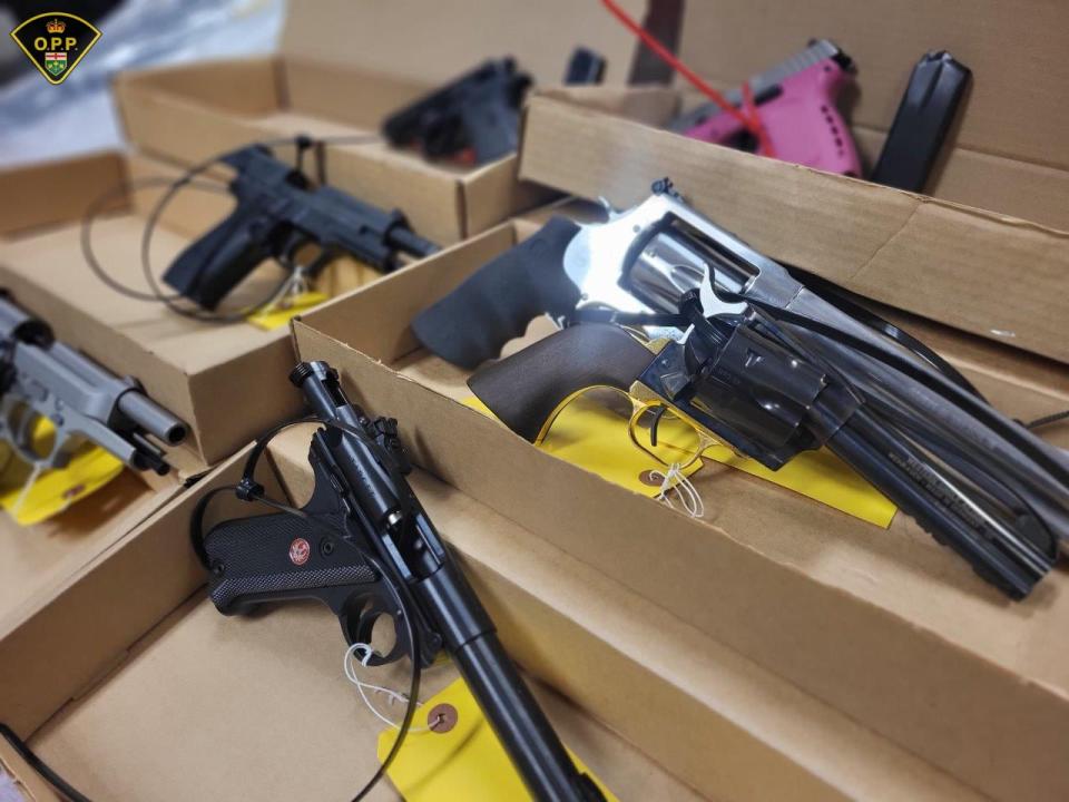 Ontario Provincial Police say they've seized multiple firearms, illegal drugs and other property valued about $200,000 after a major investigation across Ottawa, Thunder Bay, Ont., and Gatineau, Que. (Submitted by OPP - image credit)