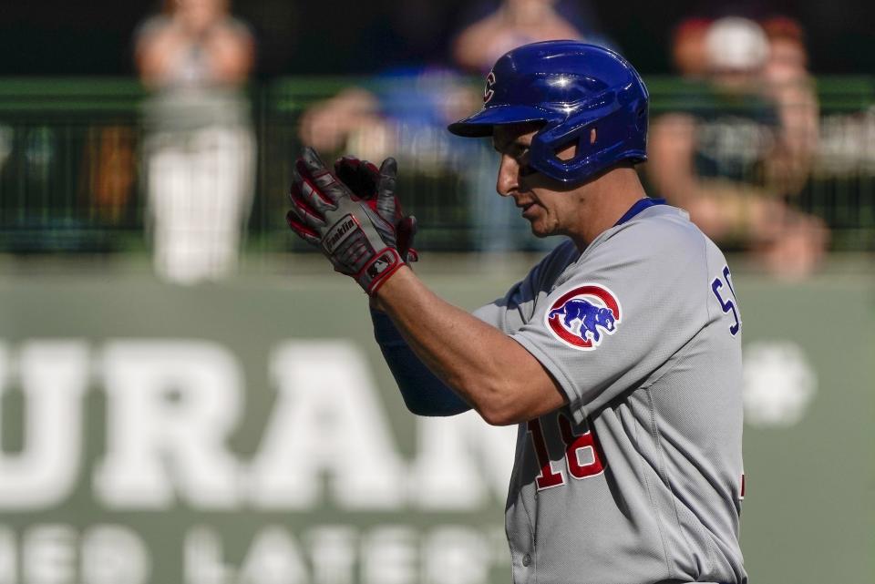 Chicago Cubs' Frank Schwindel reacts after hitting an RBI double during the eighth inning of a baseball game against the Milwaukee Brewers Sunday, Sept. 19, 2021, in Milwaukee. (AP Photo/Morry Gash)