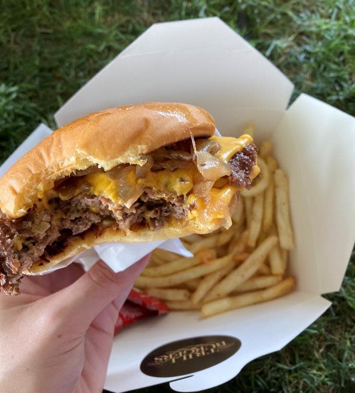 The Trill OG burger with fries from Trill Burgers in the Indio Central Market.