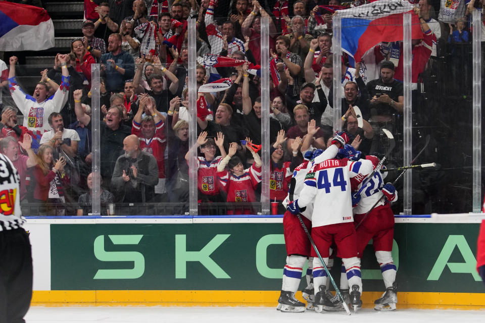 Czech Republic's Ondrej Beranek celebrates with teammates after scoring his sides third goal during the preliminary round match between Czech Republic and Norway at the Ice Hockey World Championships in Prague, Czech Republic, Saturday, May 11, 2024. (AP Photo/Petr David Josek)