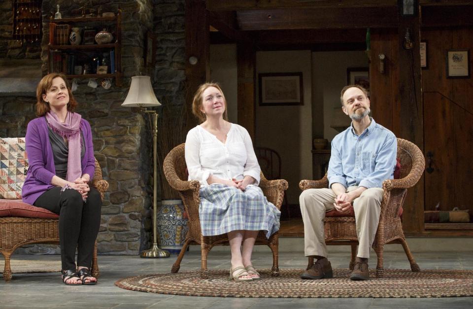 This publicity photo provided by L-R: Sigourney Weaver, Kristine Nielsen, and David Hyde Pierce in "Vanya and Sonia and Masha and Spike." All kinds of things are flipped around in the playwright, Christopher Durang's utterly refreshing farce "Vanya and Sonia and Masha and Spike," which has happily made the leap from off-Broadway to open Thursday, March 14, 2013, at the Golden Theatre. (AP Photo/O and M Co., Carol Rosegg)