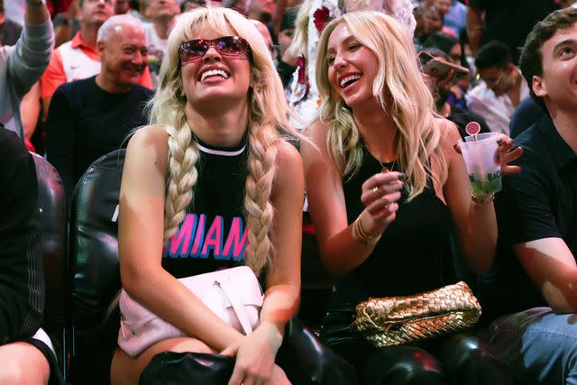 <p>Megan Briggs/Getty</p> Camila Cabello and Alix Earle attend a game between the Detroit Pistons and Miami Heat at Kaseya Center on March 05, 2024 in Miami, Florida.