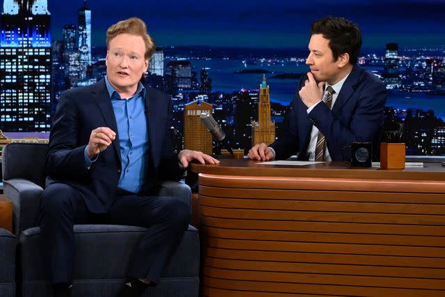 <p>Todd Owyoung/NBC via Getty</p> Conan O'Brien and Jimmy Fallon on 'The Tonight Show'