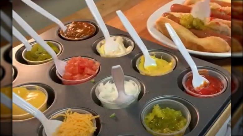 Muffin tray of condiments
