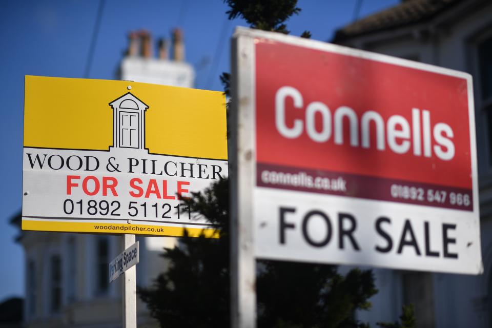 House for sale signs on a residential street in Tunbridge Wells, southeast England. Photo: Ben Stansall/AFP via Getty