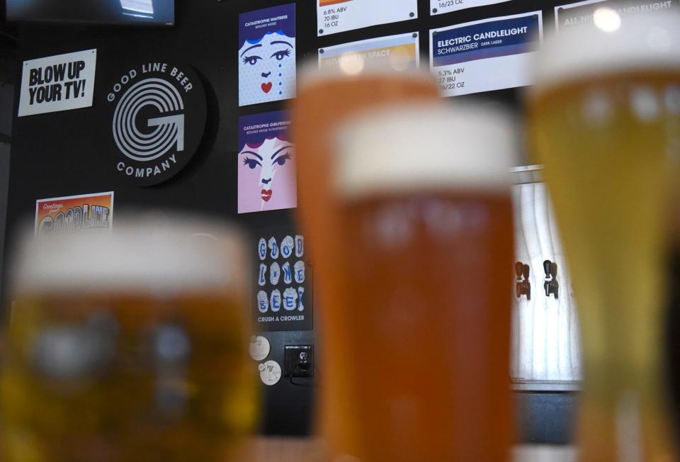 Art and graphic prints line the walls at Good Line Beer Co. on Thursday.