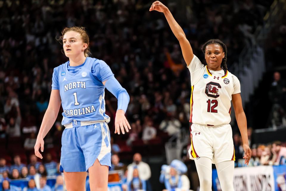 MiLaysia Fulwiley celebrates a 3-pointer as Alyssa Ustby looks on during South Carolina's 88-41 win.