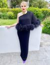 <p>Director Emerald Fennell gets all dressed up at home for Thursday night's Film Independent Spirit Awards. </p>