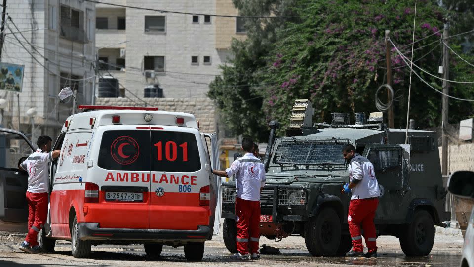 An Israeli military vehicle blocks a road leading to a hospital in Jenin on Friday. - Ronaldo Schemidt/AFP/Getty Images