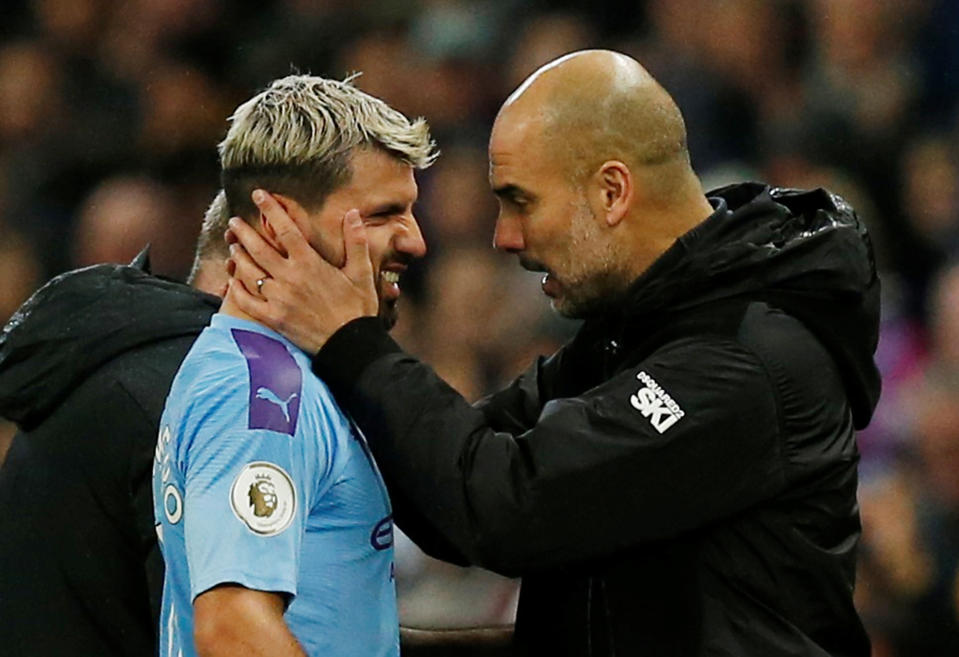 Sergio Aguero (left), Pep Guardiola and Manchester City may have won Saturday, but there's a different feel about this season. (REUTERS/Andrew Yates)